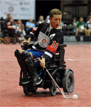 Powerplay center and two-time tournament MVP, Jake Saxton, winds up for a wrist shots during the tournament game against the Ottawa Selects in the quest for the Powerhockey Cup in St.Paul, Minnesota.