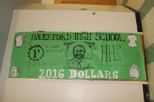 The shared door of Ms. Hartman (2016-G) and Ms. Forgeng's (2016-F) homerooms showed the junior class colors through a special "2016 Dollars" bill 