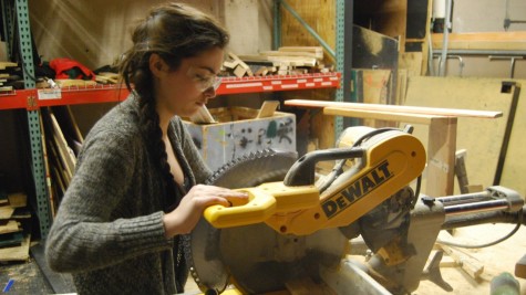 Sawdust filled the air as Sophomore Liv Demarco easily cut a piece of wood using a huge saw backstage. Next time, The Fordian staff are a gonna bring   goggles. 