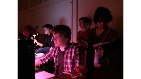 Lighting Designer Sophomore Jacob Kaufhold works with fellow techies Jack Feder (right), Cullen Wilson (behind) and master techie Ben Kurtze (far left). 
