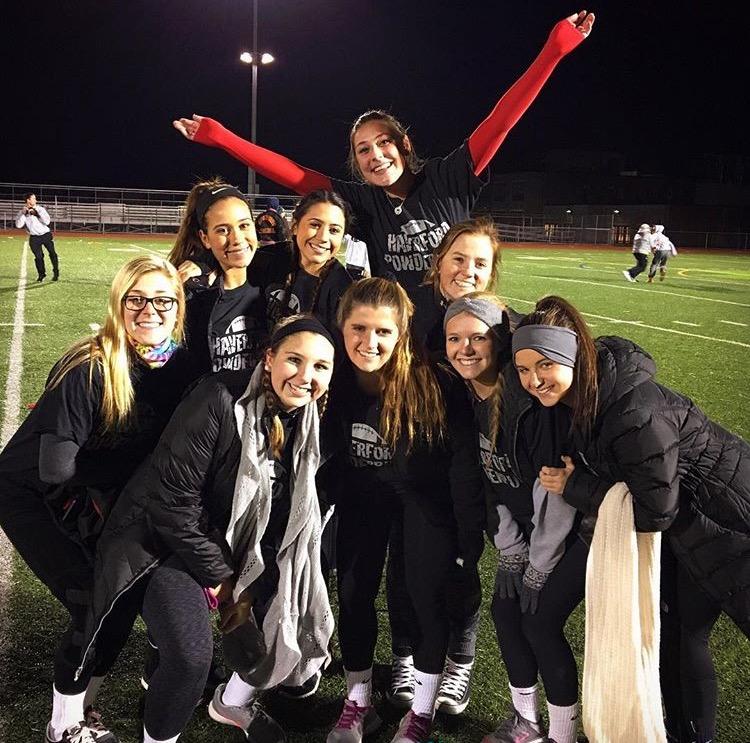 Senior lady Fords celebrate their win over the juniors during this years cold Powderpuff competition. 
