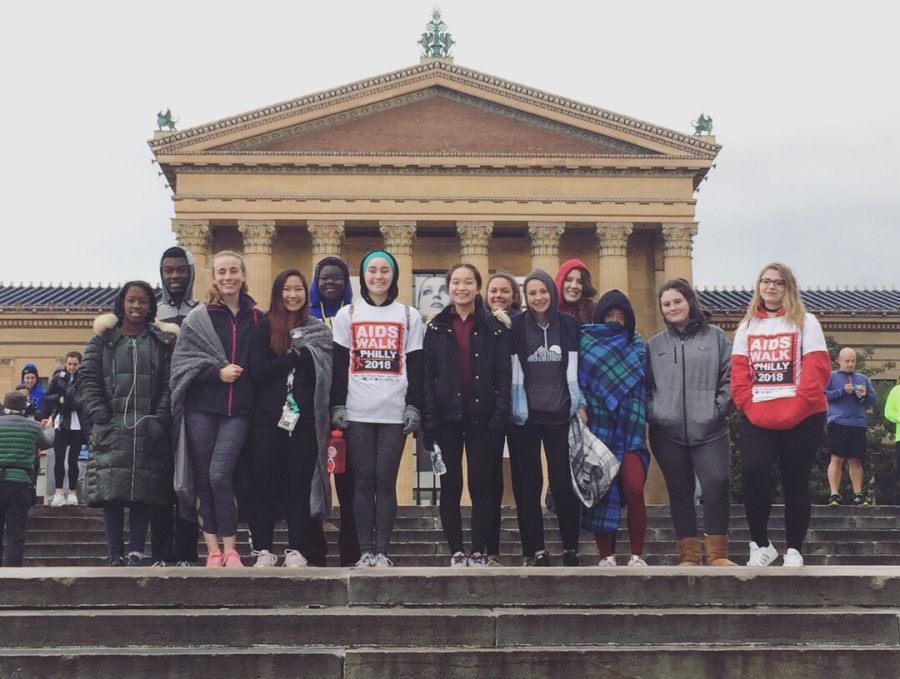 Interact Club members pose on the steps of the Philadelphia Museum of Art.  