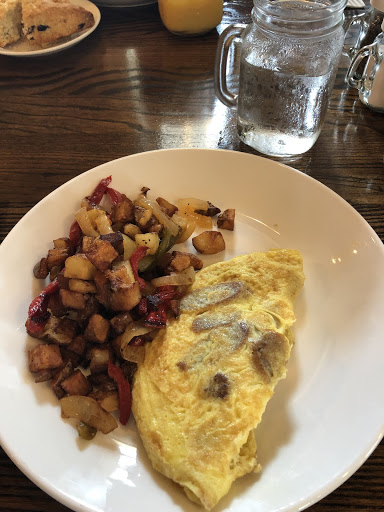 An Irish Omelette with bangers and rashers is served at The Hearth.  