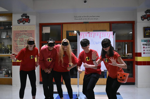 Students coordinated their costumes as the family of The Incredibles, welcoming children into the Carnival.
