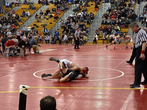 At the Southeast Regional Tournament in Souderton, Stephen Lozano competes against Roberto Lesser of Harriton. 