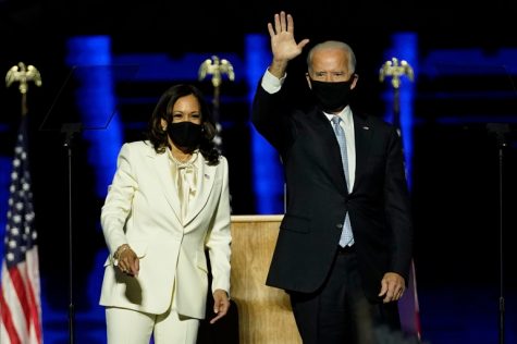 President-elect Joe Biden, right, on stage with Vice President-elect Kamala Harris, left, Saturday, Nov. 7, 2020, in Wilmington, Del.
