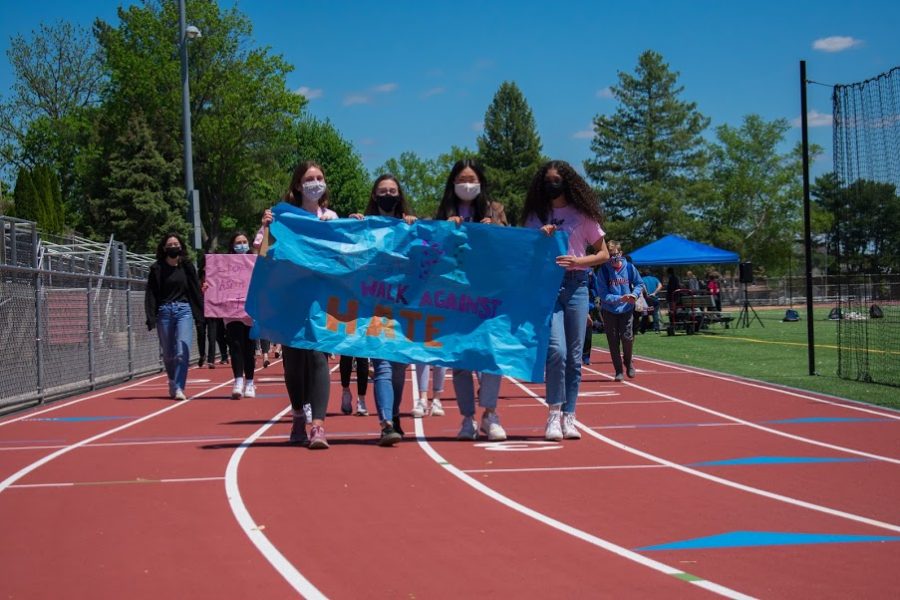 The No Place For Hate officers lead the Walk Against Asian Hate. (Left to Right: Sophomore Katie Blickley,  Senior Bella Monzo, Sophomore Jean Park, and Senior Taylor Pickering)