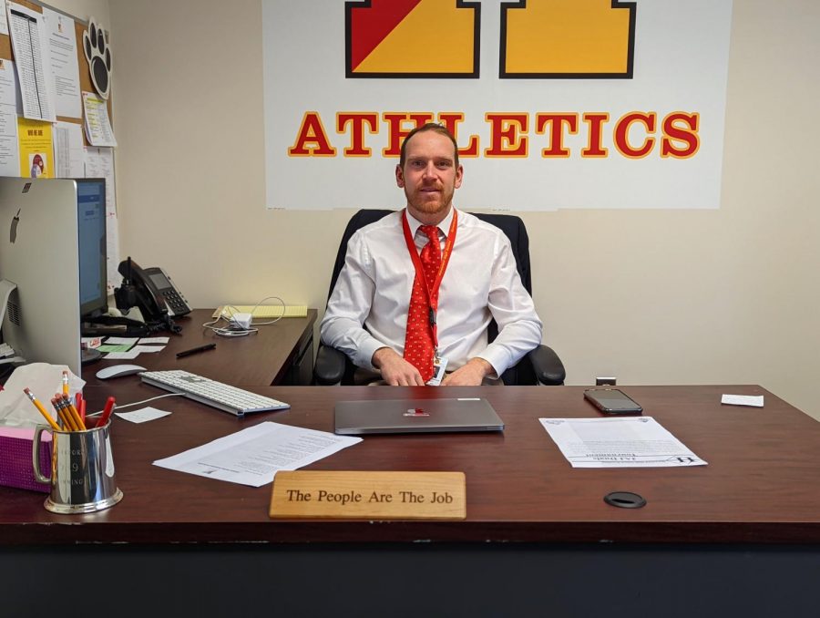 New Athletics Director and Assistant Principal, Greg Decina, organizes the HHS athletics program from his first floor office. 