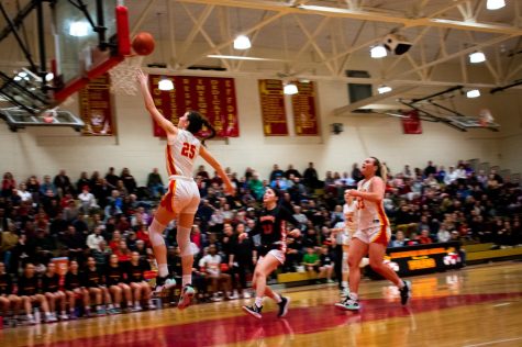 Girls Basketball Plows Through District 1 Playoffs Maintaining Their Undefeated Record: A Season Recap