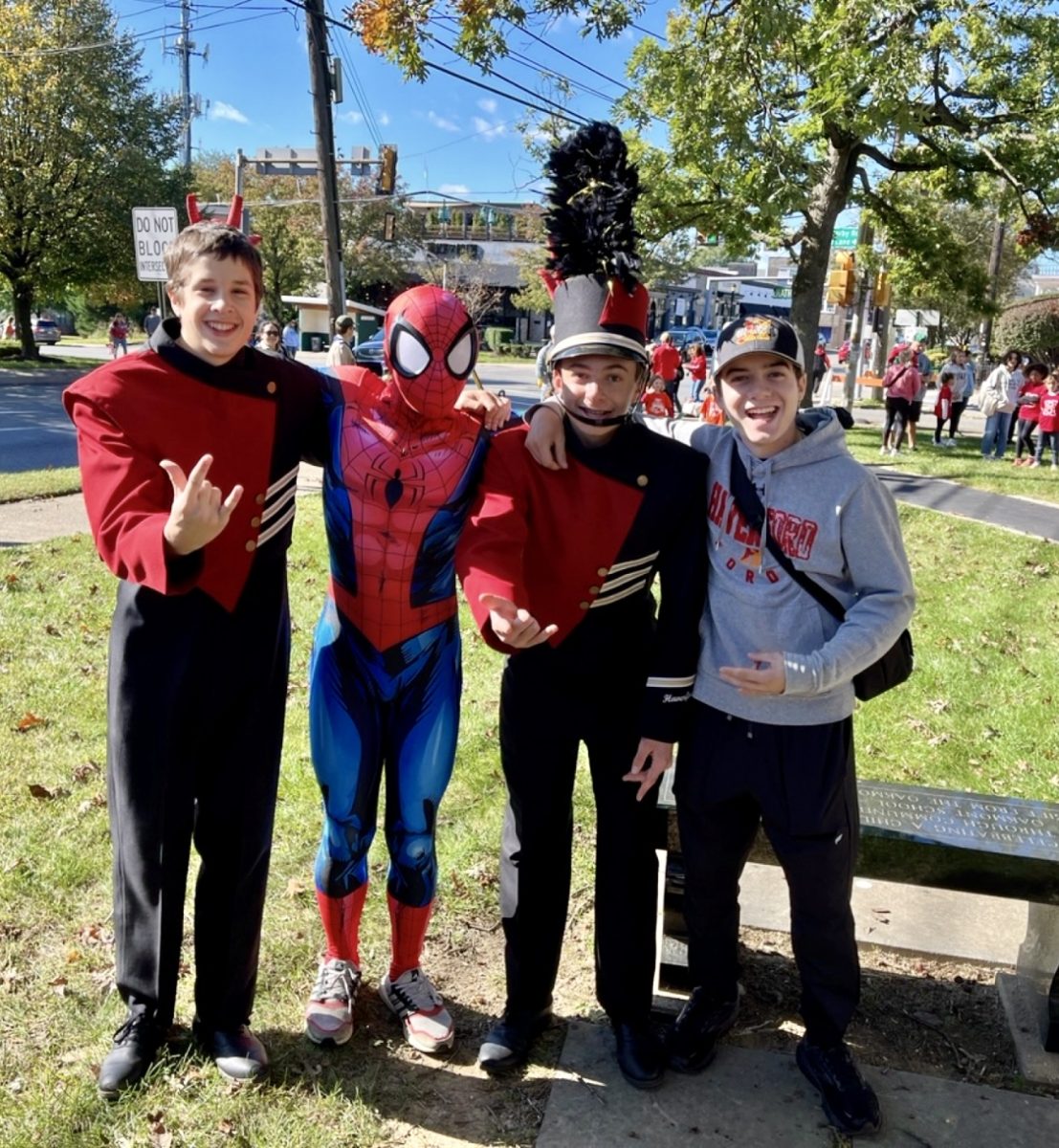 Ryan Cartafalsy, Spiderman, Max Wilson, and AJ Daniels pose for a photo before the Haverford Township Day parade.