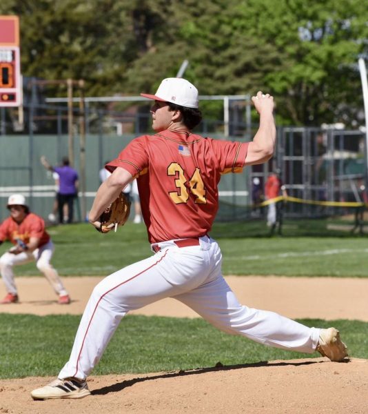 Senior Will Hoffman pitches a perfect game against Harriton High School.