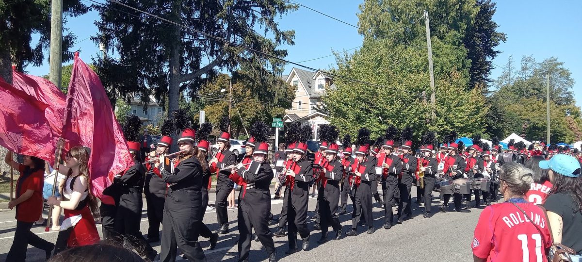 The Haverford High School Marching Band performs Elton John's "I'm Still Standing" for an applauding crowd.