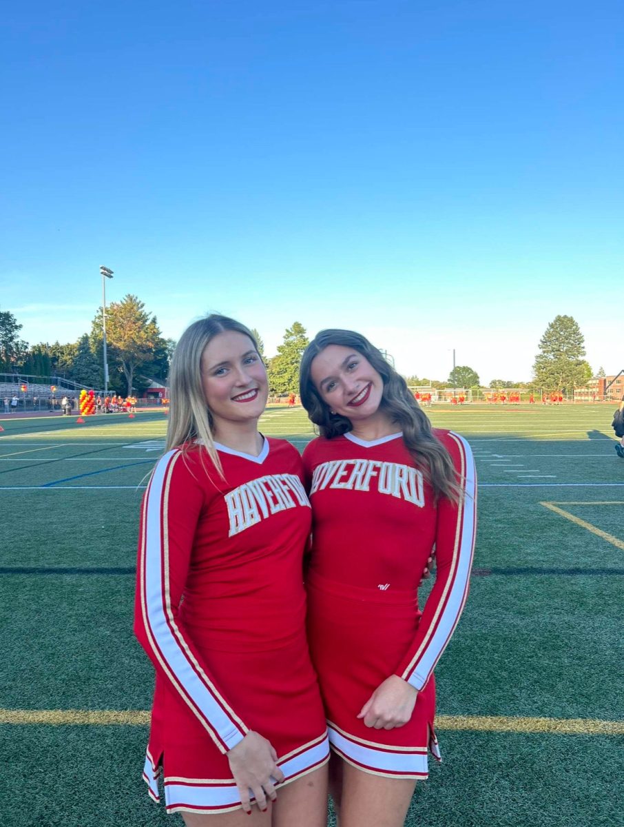 Senior cheerleaders, Maddie Sylvester (right) and Maya Canterino (left), enjoy their senior night celebration. 