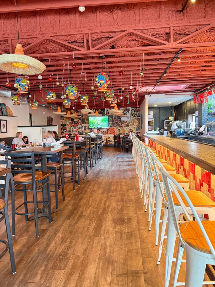 A peek inside the vibrant atmosphere of Al Pastor. 