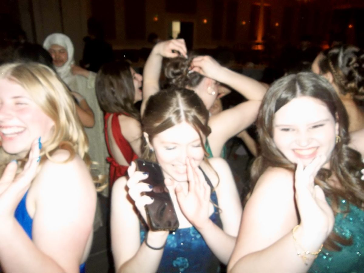 Mary Orner, Lilli Schugsta, and Lucy Jones dance the night away at Junior Prom.