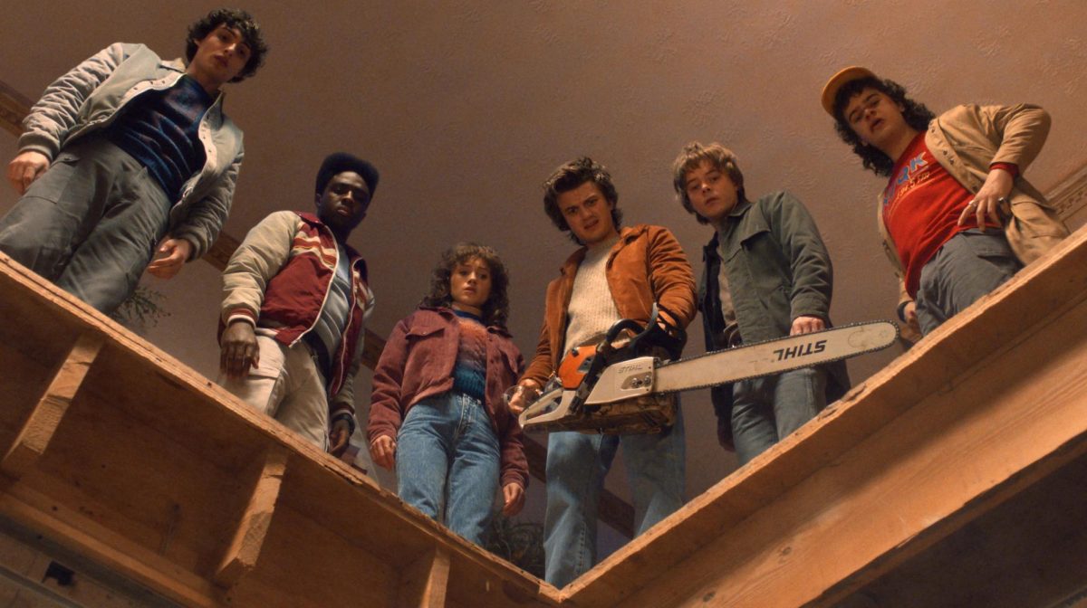 Web image from Stranger Things Season 5, Episode 3 (The Turnbow Trap). Image features   (from left to right) actors Finn Wolfhard as Mike Wheeler, Caleb McLaughlin as Lucas Sinclair, Natalia Dyer as Nancy Wheeler, Joe Keery as Steve Harrington, Charlie Heaton as Jonathan Byers, and Gaten Matarazzo as Dustin Henderson.
