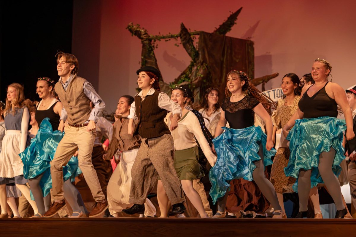 Sebastian Landon as Jesse Tuck and Delilah App as Winnie Foster in the upbeat number, Partner in Crime. (Photo courtesy of Justin Walsh Photography) 

