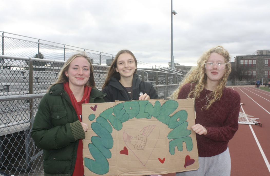 United World Club members Keira Horn (Junior), Juliet Kane (Junior), Danielle Globig (Junior) at the Walk For Immigrant Families.